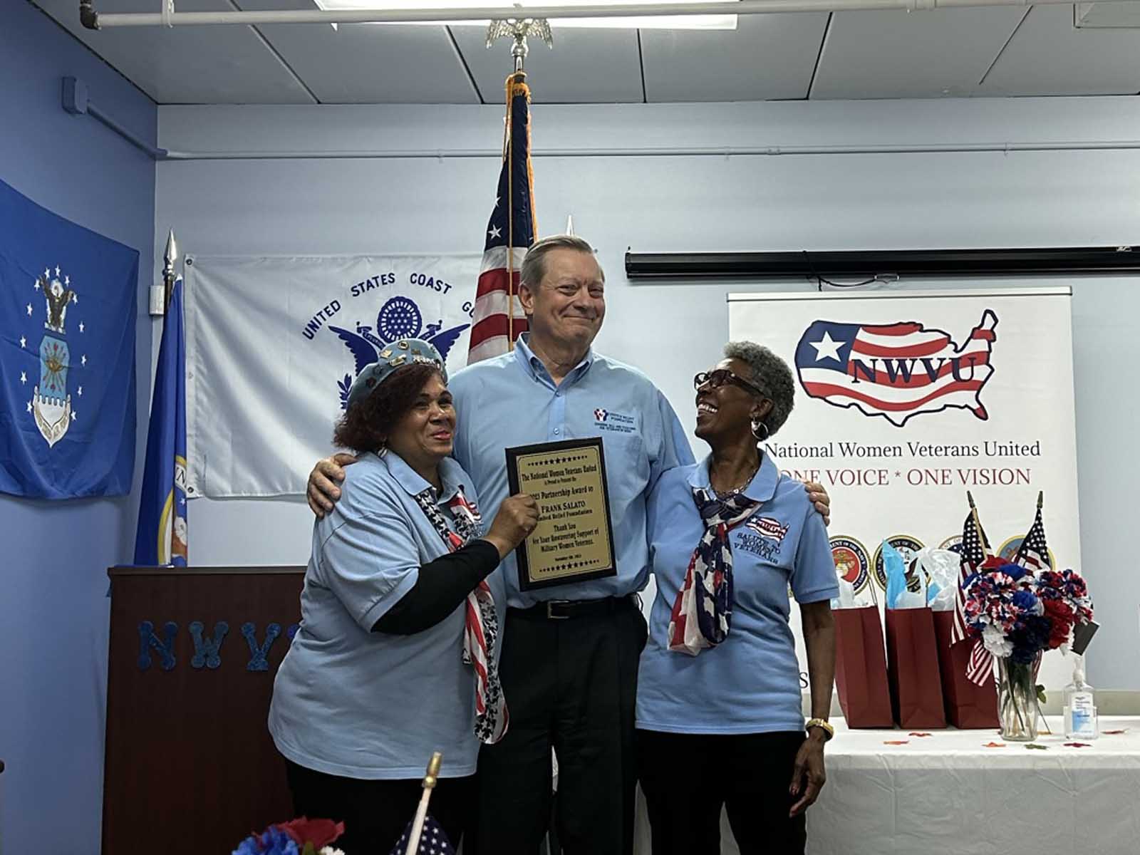 United Relief Foundation Frank Salato receiving National Women Veterans United award